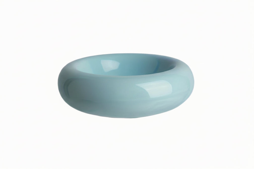 Blue ceramic bowl with dimensions on a white background
