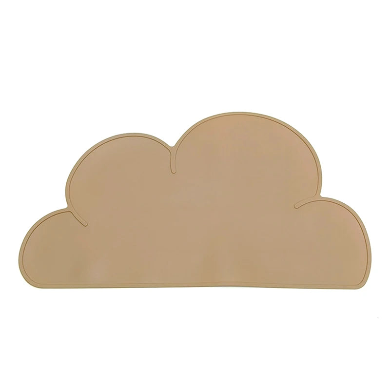 Minimal cloud-shaped feeding mat in a soft neutral tone photographed on a clean white background.